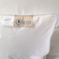 Oreiller Castex mi-ferme en duvet avec maintien cervical et finition haut de gamme